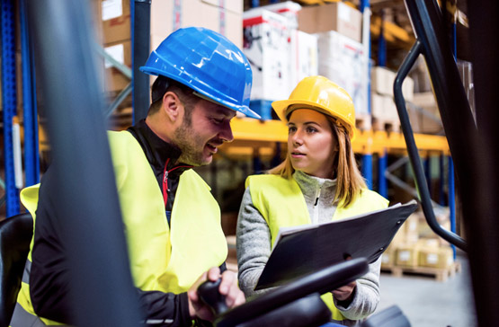 Workers in forklift